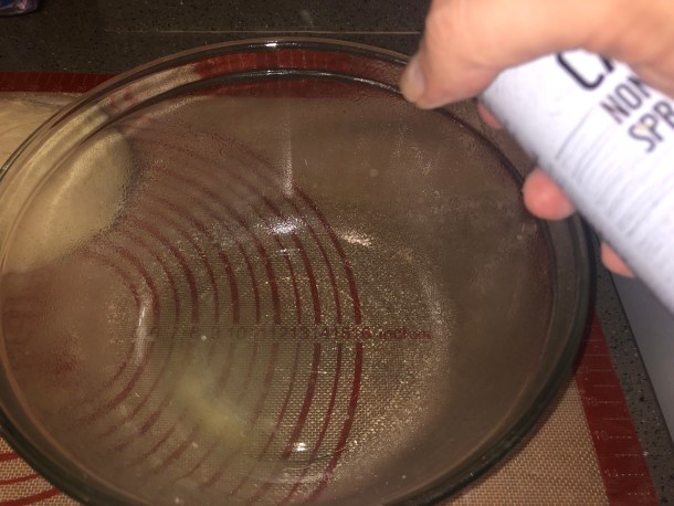 Cooking Eorzea | Nonstick spray being sprayed into a bowl.