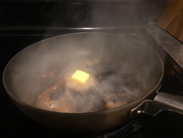 Cooking Eorzea | Adding butter to the same pan.